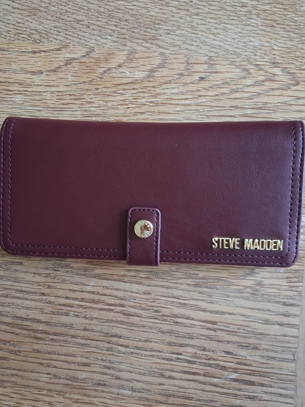 The Steve Madden Ballen Bi-fold Cranberry Wallet